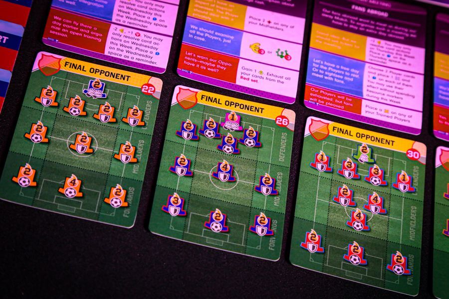 Football-themed game cards showing player positions and formations on a field backdrop