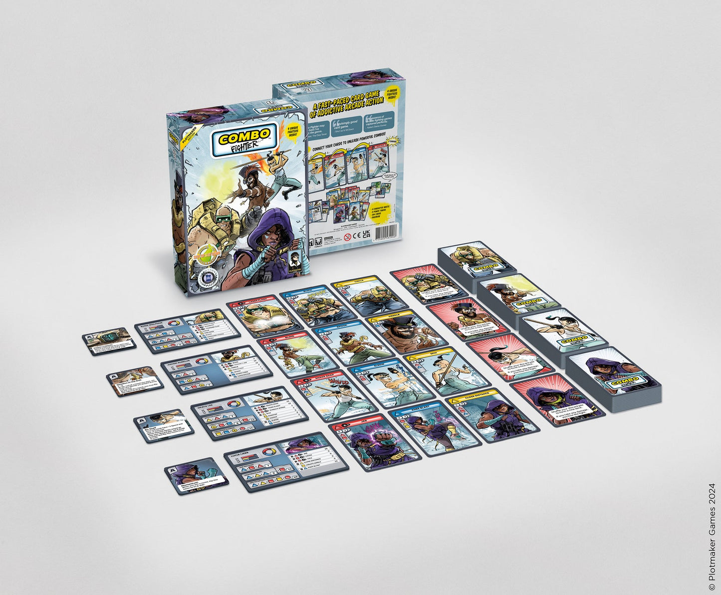 Combo Fighter card game box, character sheets, and action cards laid out, featuring colorful fighting characters