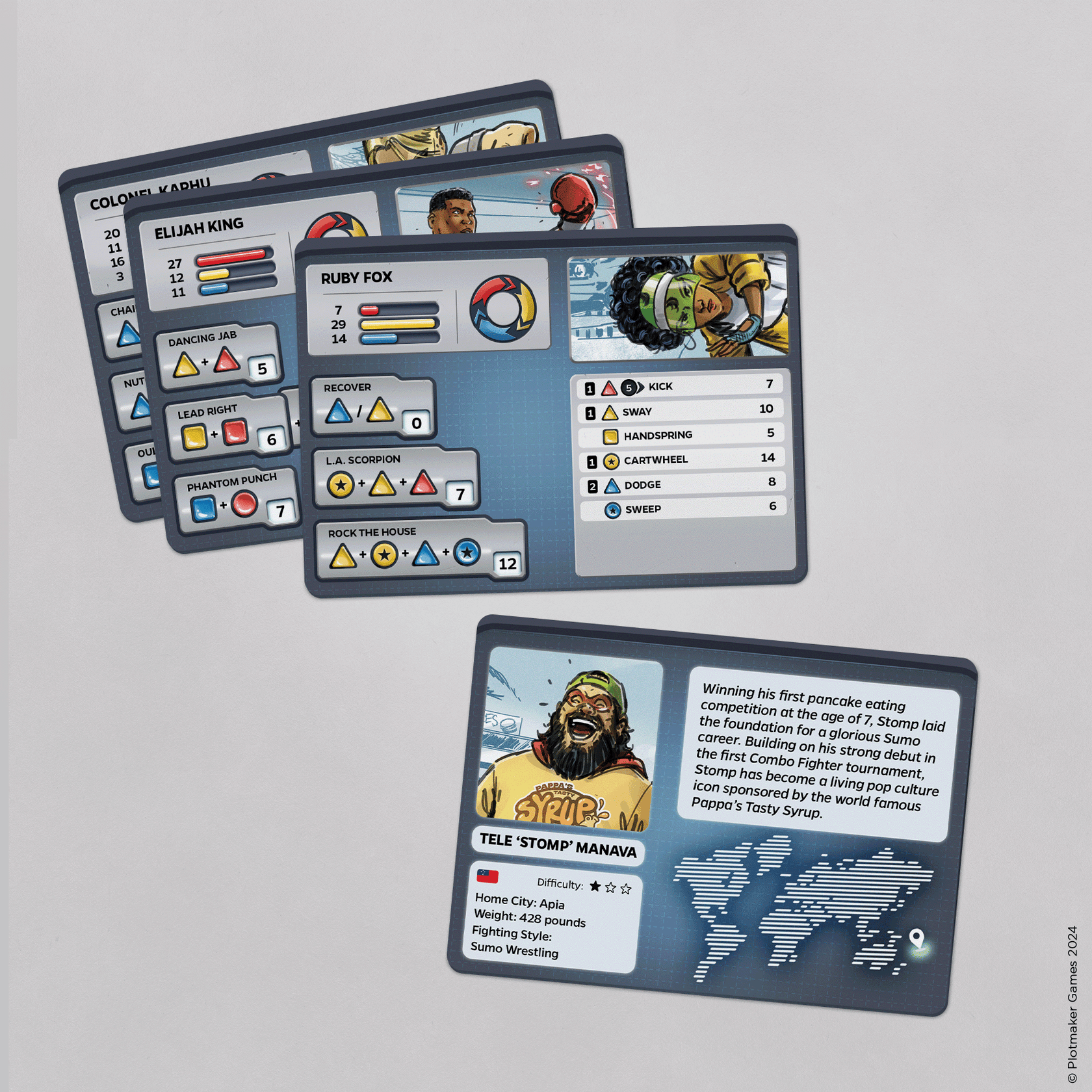Tabletop fighting game cards displaying character art, stats, and combat move lists on a gray surface