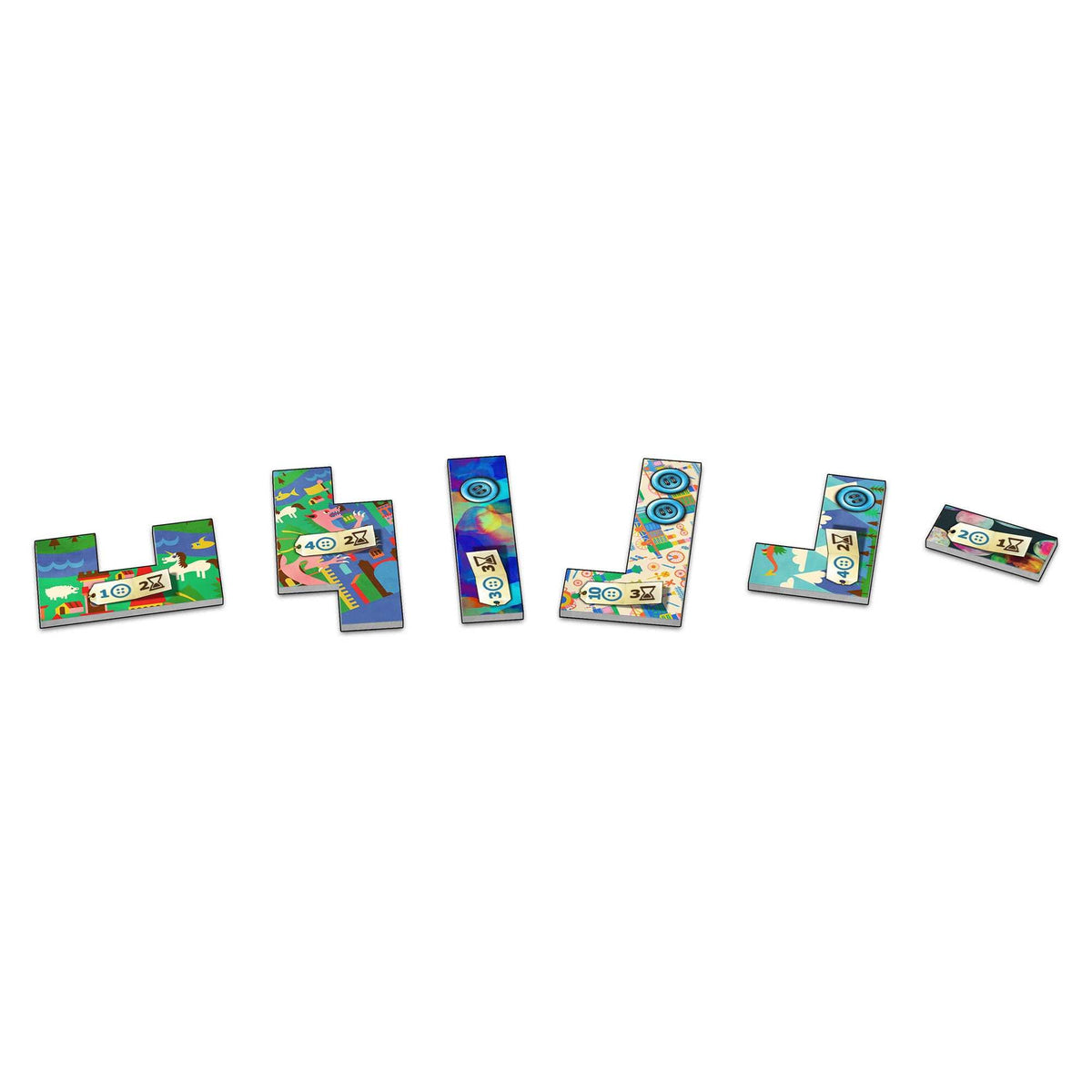Multiple colorful game tiles with diverse illustrated scenes, numbers, and symbols, laid out on a white surface