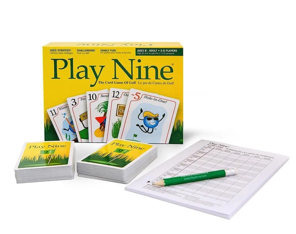Play Nine golf card game set: yellow box, fanned golf-themed character cards, two decks, scorepad, and pencil.