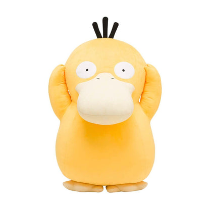 Yellow Psyduck plush toy stands with flippers pressed to its head, on a white background