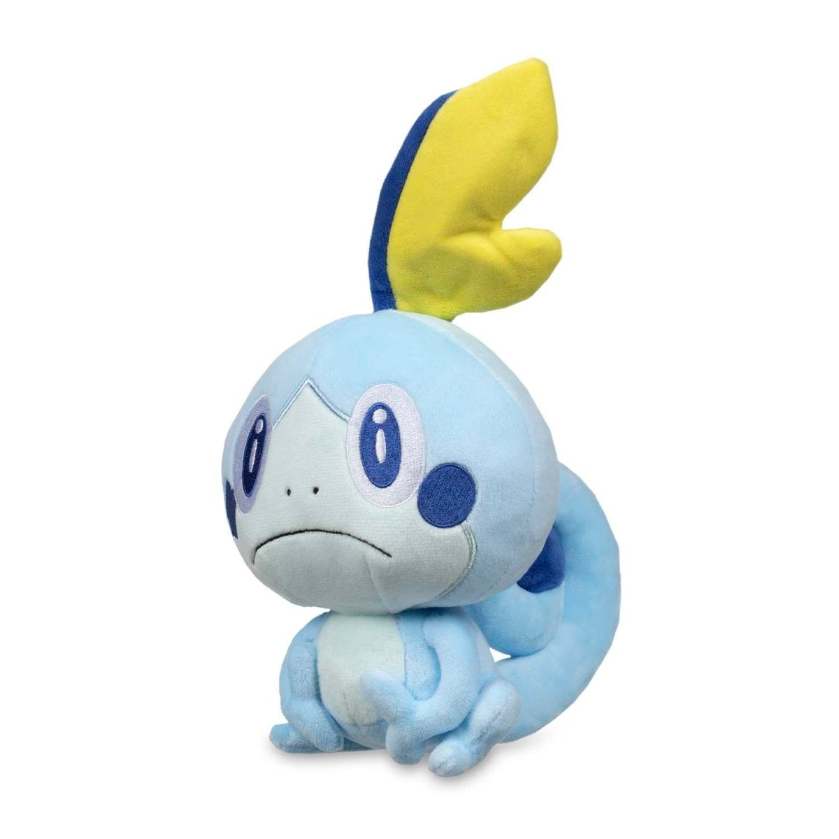 Light blue Sobble Pokemon plush toy with a sad expression and yellow head fin, sitting