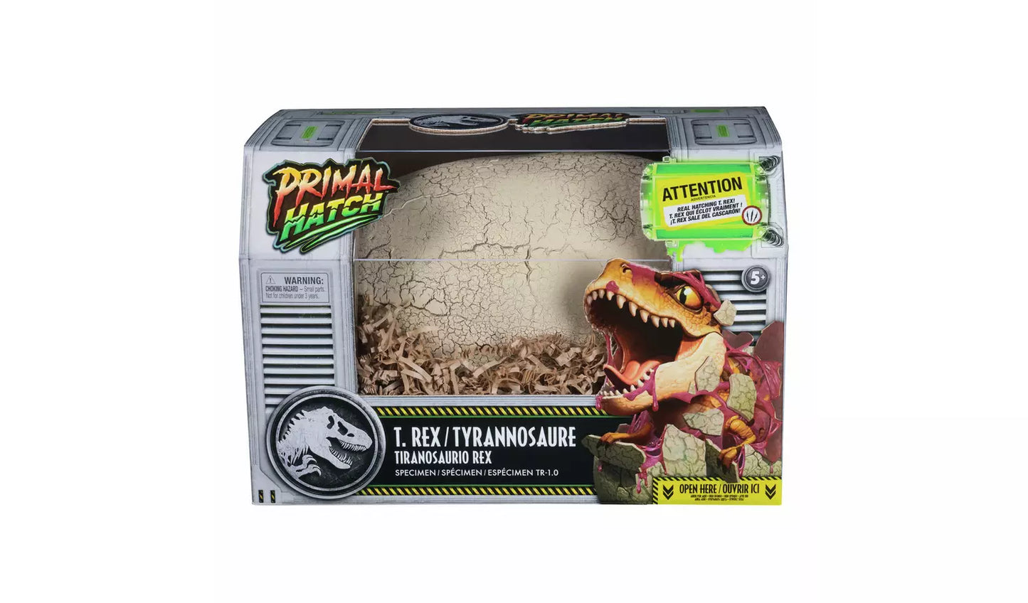 Jurassic World Primal Hatch T-Rex toy box: A large cracked dinosaur egg inside, with a graphic of a red T-Rex hatching on the front
