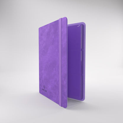 Gamegenic prime album open to textured pages for trading cards, with an elastic closure strap