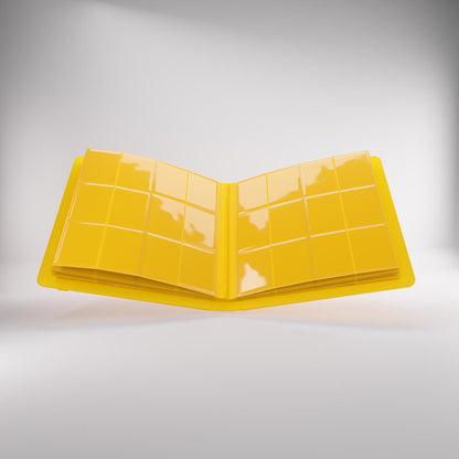 Open prime album with clear plastic pages featuring multiple pockets for storing trading cards or photos, displayed against a light background