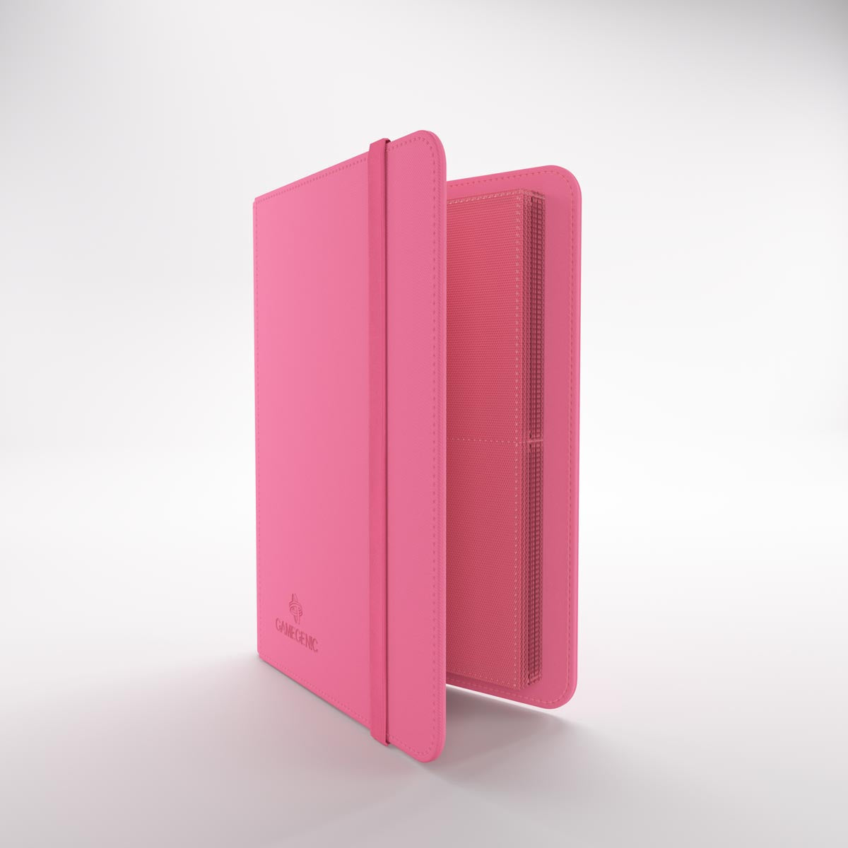 Gamegenic prime album open to textured pages for trading cards, with an elastic closure strap