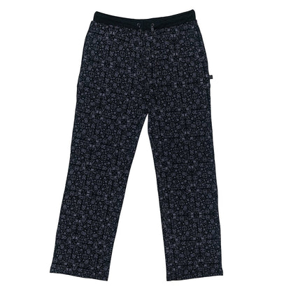 Black lounge pants with a repeating pattern of pop culture symbols and a drawstring waist