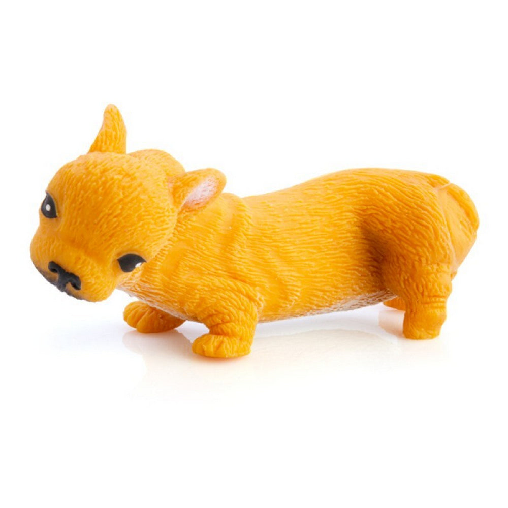 An orange toy animal with small ears, black eyes, and snout, standing