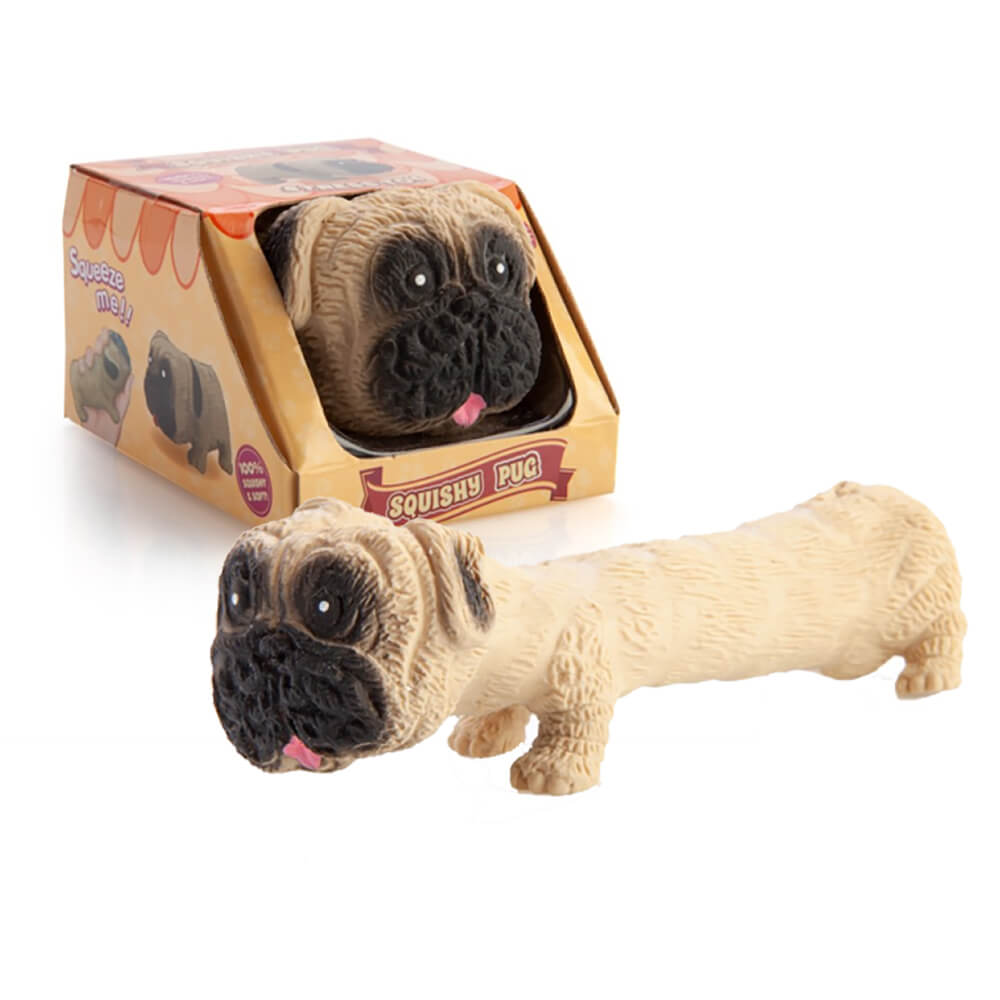 A tan "Squishy Pug" toy, with a black snout and pink tongue, half in its box, and another stretched out