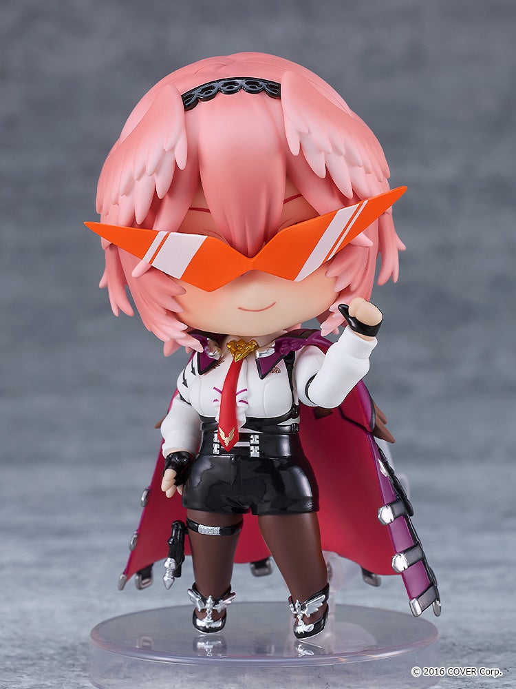 Nendoroid figure of a female character with pink hair orange sunglasses white shirt black shorts and a red cape