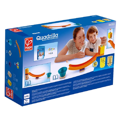 Hape Quadrilla Marble Run toy box displaying a woman and boy smiling while playing with the construction tracks