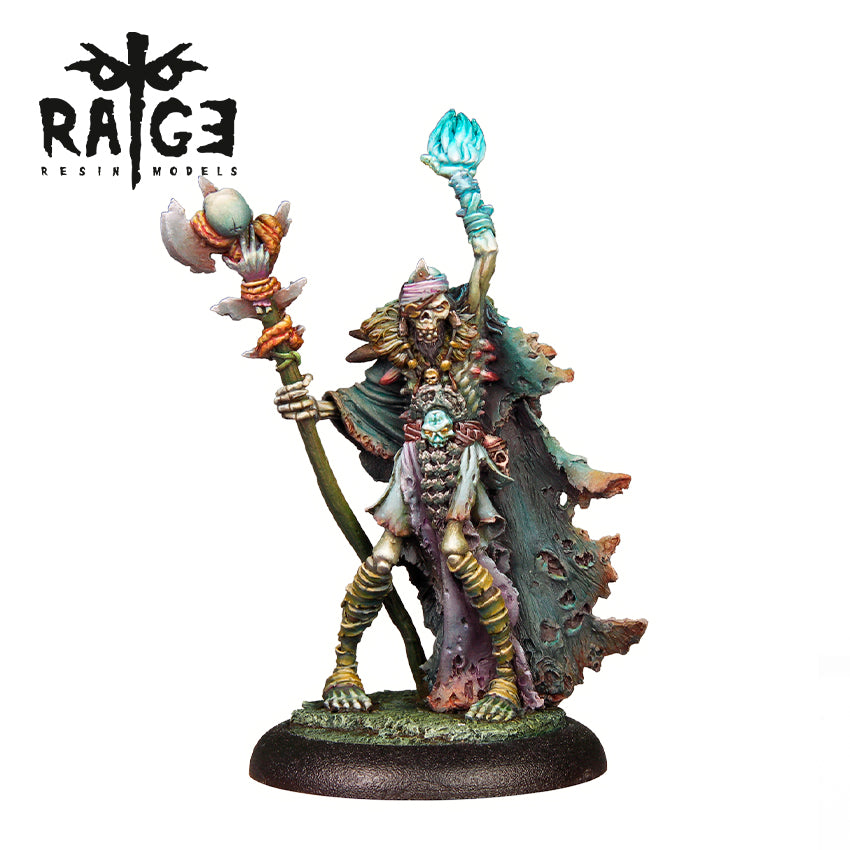 Skeletal shaman miniature in tattered robes, holding an axe-staff and raising a glowing blue orb