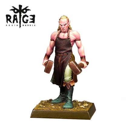 A painted miniature blacksmith figure a muscular elf in an apron holding two hammers standing on a rocky base