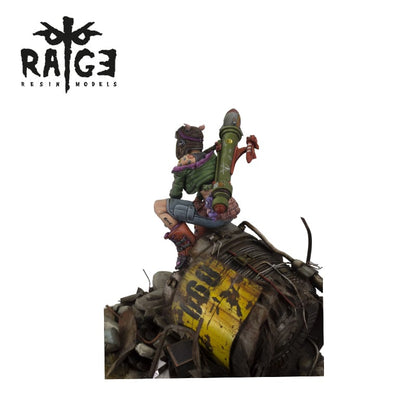 RAGE RESIN MODELS: Miniature of a scavenger with a rocket launcher, perched on a large piece of industrial wreckage