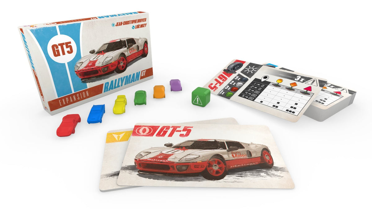 A Rallyman GT5 board game expansion set: box with a race car, colorful car tokens, game cards and a die