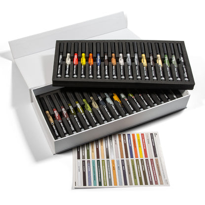 A white open box holds two foam trays of Real Colors Markers, with 34 units visible, alongside a color swatch sheet on a white background