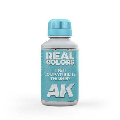 AK Real Colors High Compatibility Thinner bottle, with a light blue cap and distressed teal label.