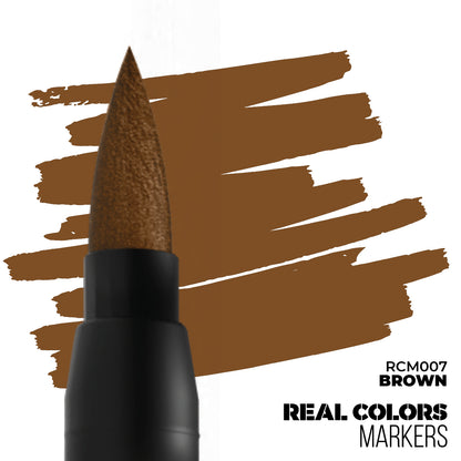A brown brush marker tip creating brown strokes on a white background. Text: RCM007 BROWN, REAL COLORS MARKERS