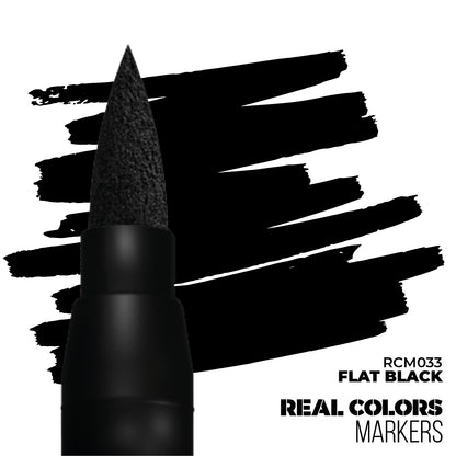 Close-up: Black marker's felt tip over bold black strokes on white background. Labeled 'Flat Black'
