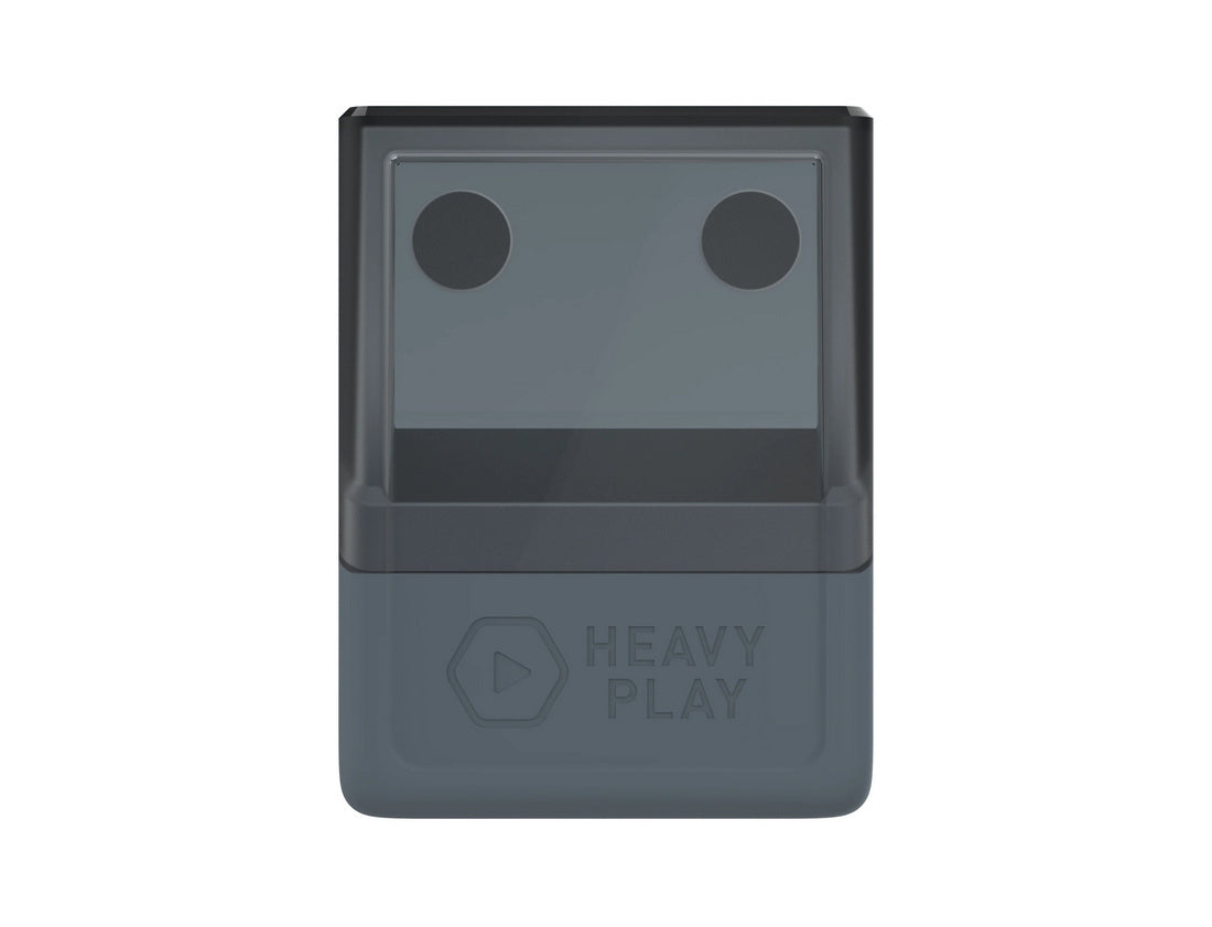 Its upper half features two circular dark shapes, and its lower half has a &#39;HEAVY PLAY&#39; logo and play button