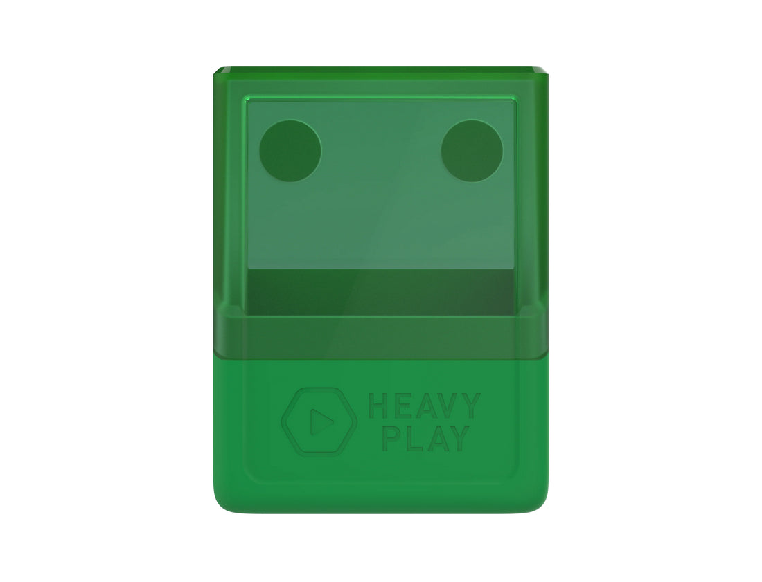 Green rectangular box with a transparent top, two dark circular indents, and &#39;HEAVY PLAY&#39; branding on its solid base