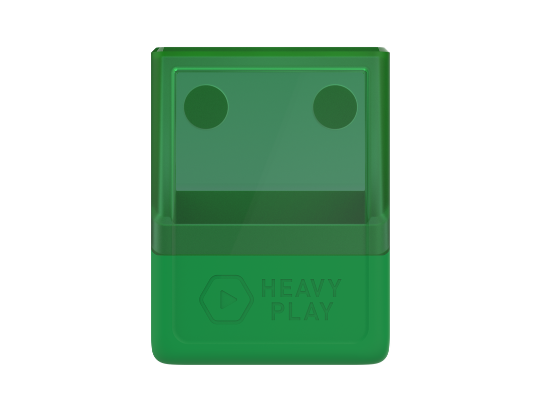 A vibrant Druid green, two-part rectangular case. Its translucent top features two circular indents, while the opaque base shows a &#39;HEAVY PLAY&#39; logo