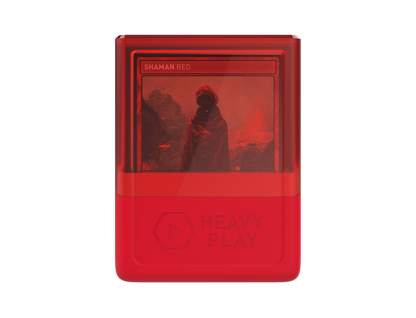 Shaman Red deck box,' shows a cloaked figure in a red, rocky landscape. 'HEAVY PLAY' logo is embossed below