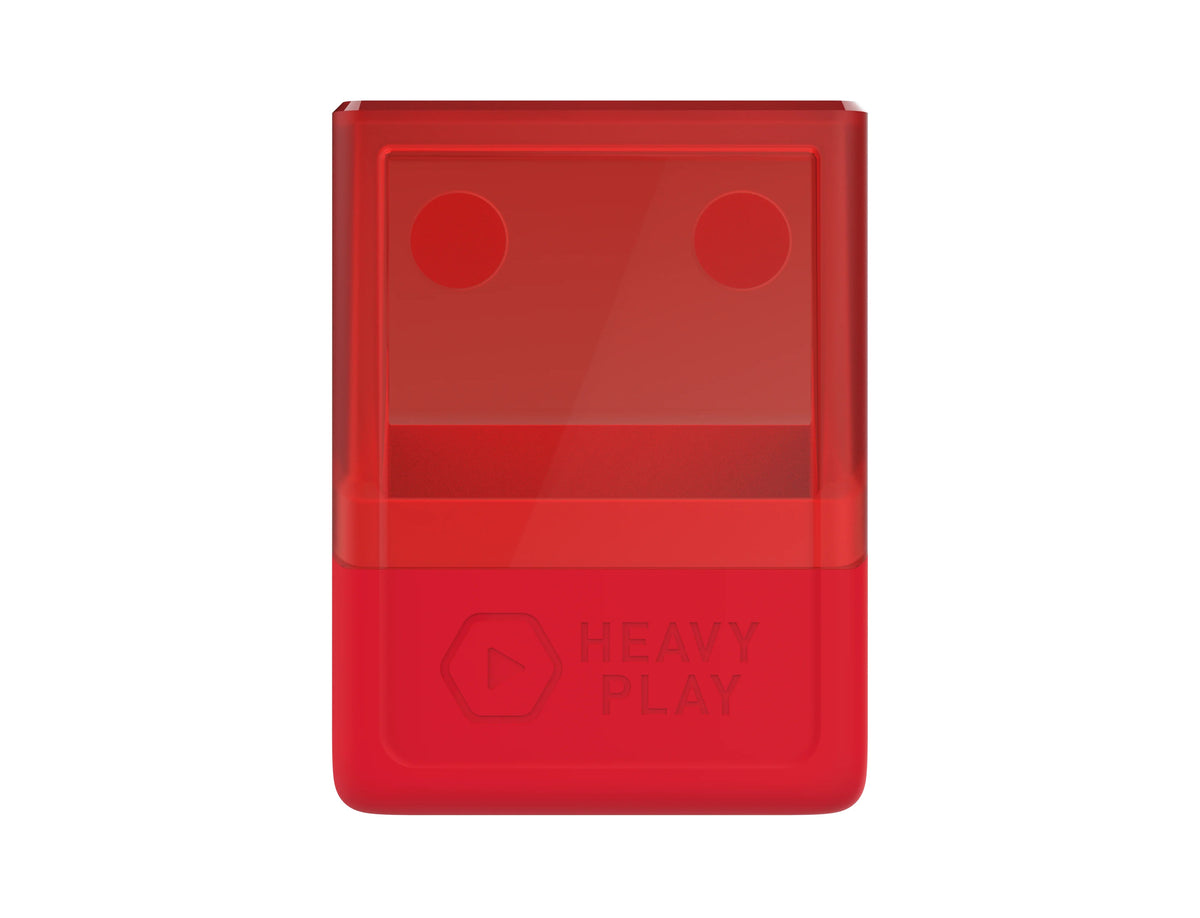 Red rectangular device with a translucent top showing two dark circles, and an opaque bottom embossed with &#39;HEAVY PLAY&#39; text