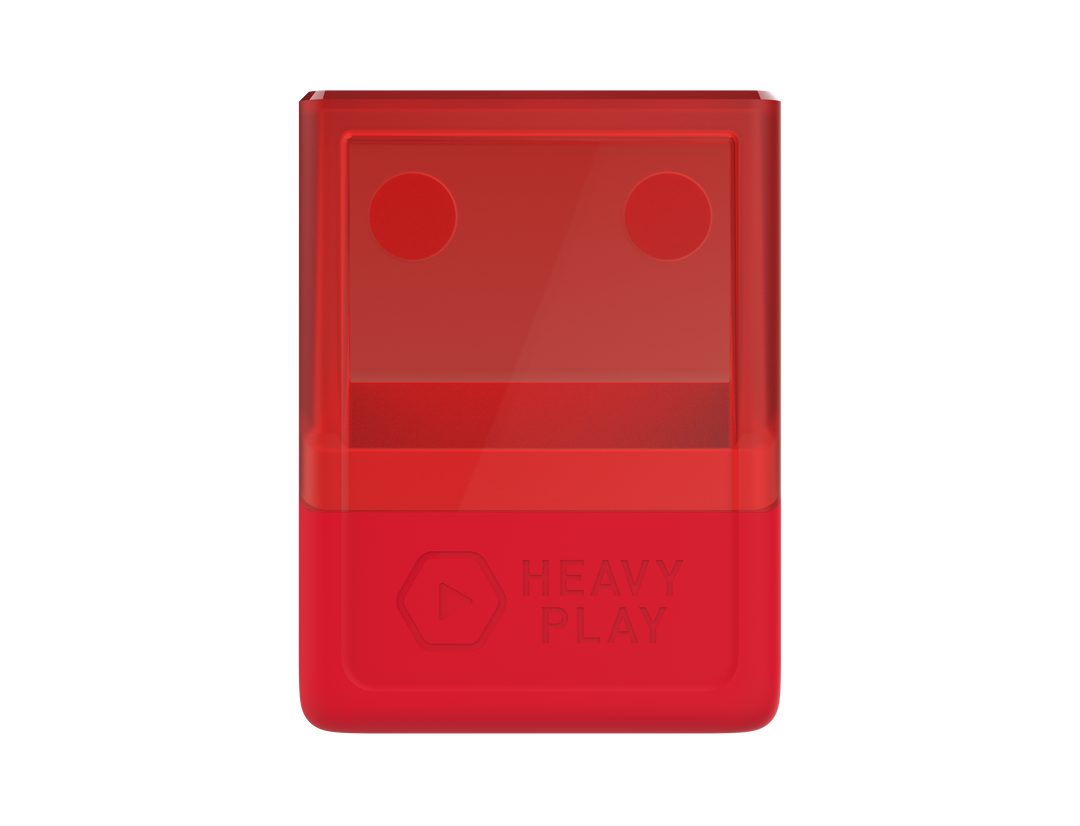 A red, rectangular container with a translucent top showing two circular indents. &quot;HEAVY PLAY&quot; logo on the opaque base