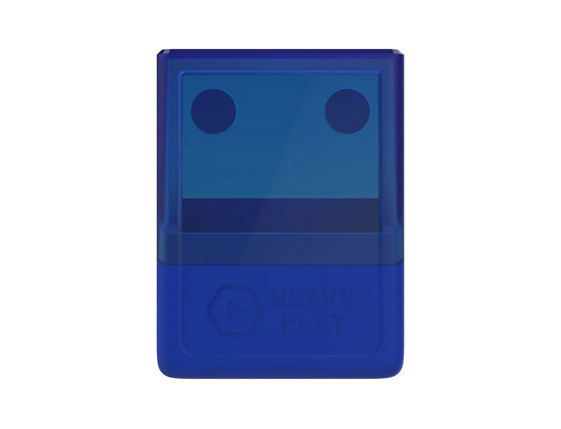 A blue rectangular device with a translucent top featuring two dark circles, and an opaque bottom with a &quot;HEAVY PLAY&quot; logo