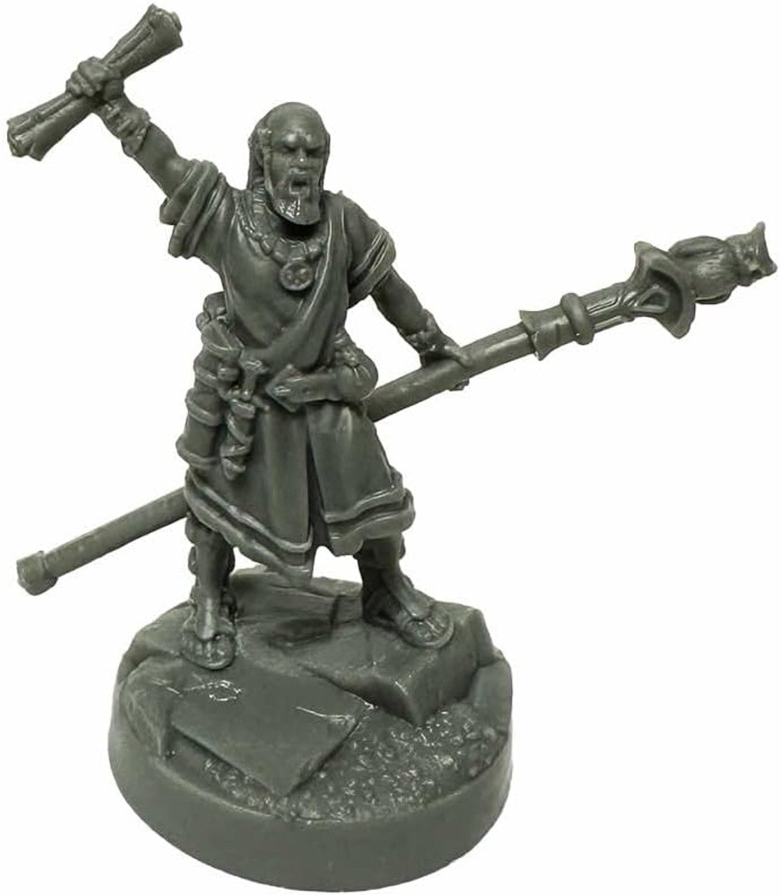 A grey unpainted miniature figure of Giannis, a Greek Mage, holding an open scroll high and a staff with a bird-like finial, standing on a rocky base