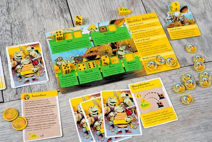 Ahoy: Rivals & Renegades Expansion board game components spread on a wood table, featuring turtle character cards, yellow dice, and tokens