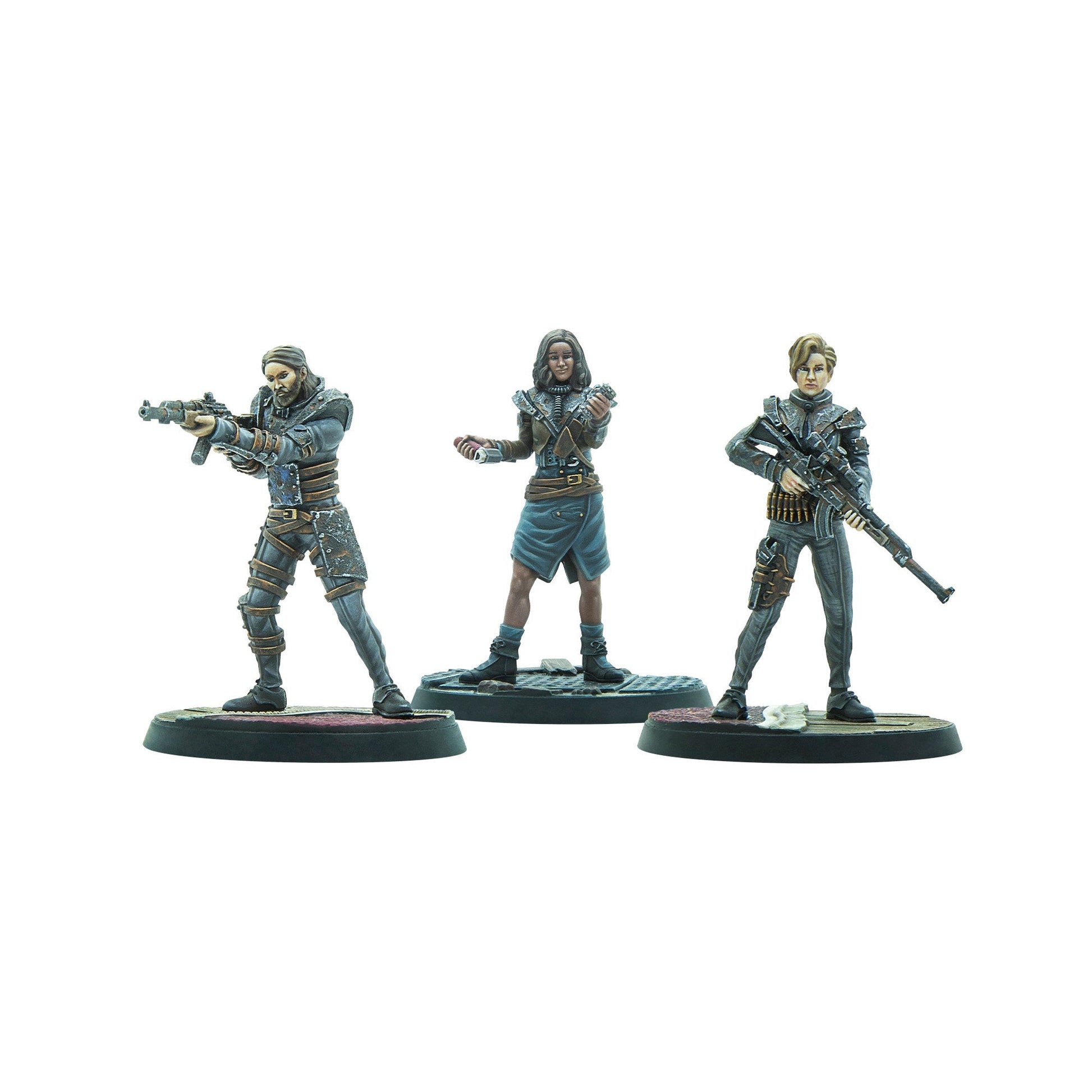 Three character miniatures: a man aiming a rifle, a woman holding tech devices, and another woman carrying a rifle