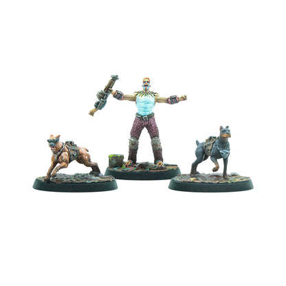 Painted miniatures: A man with a sci-fi rifle, flanked by two dogs with gear, one wearing goggles