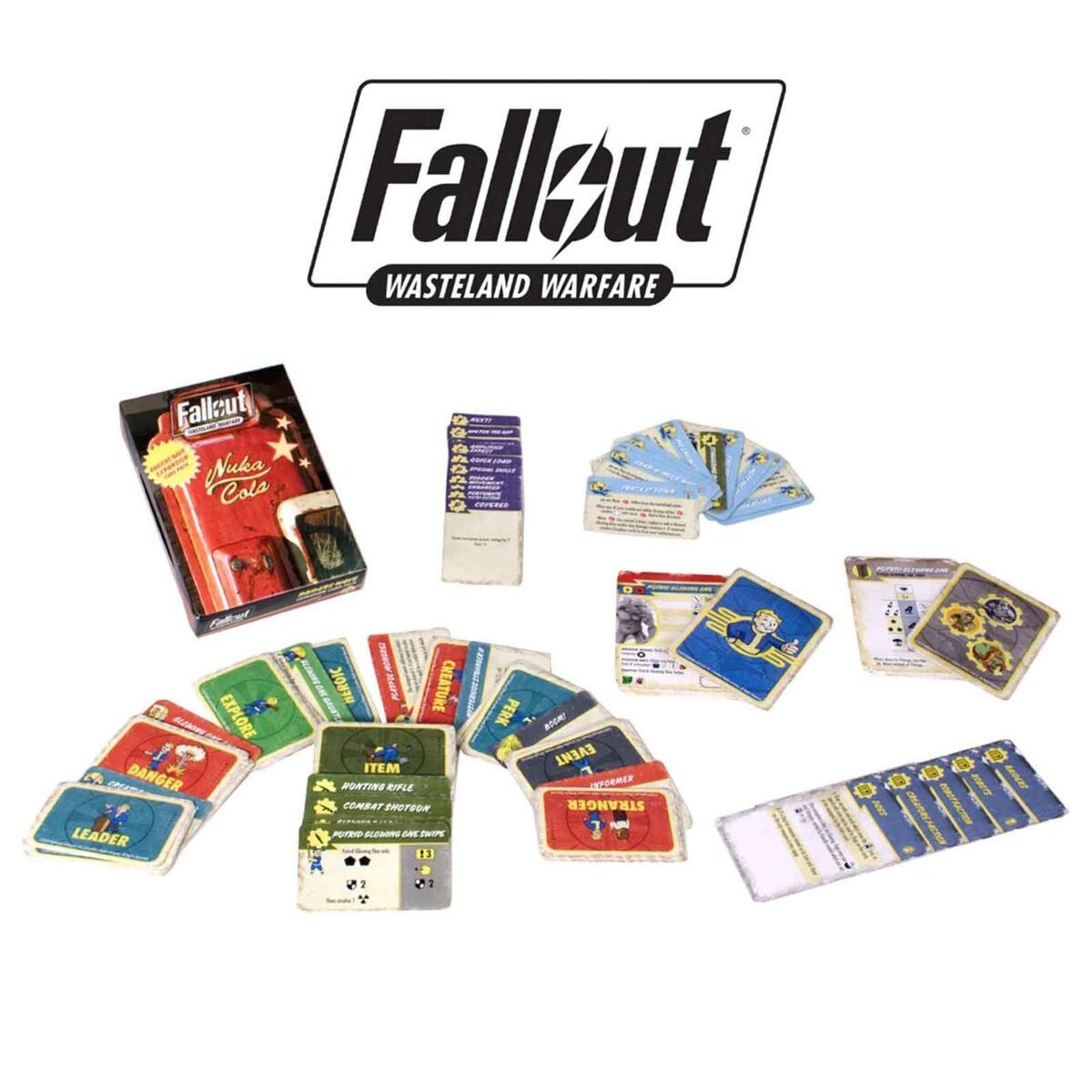Fallout Wasteland Warfare game components: many colourful cards for items, creatures, and events, plus a Nuka Cola box