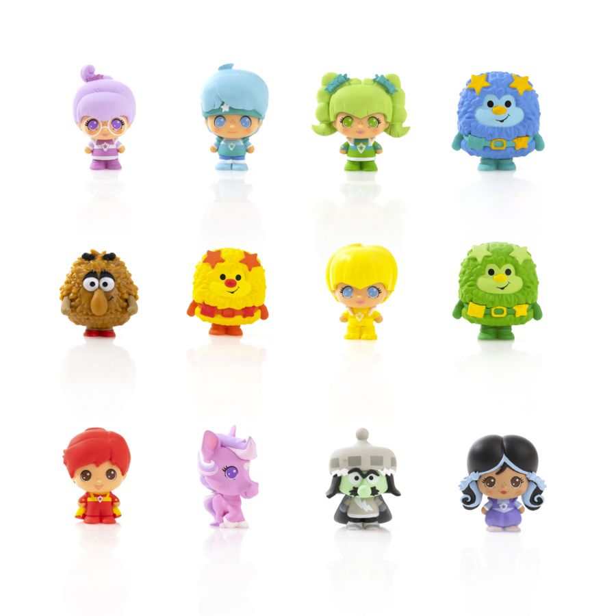 Twelve brightly colored collectible figures on white background, including dolls, monsters, and a unicorn