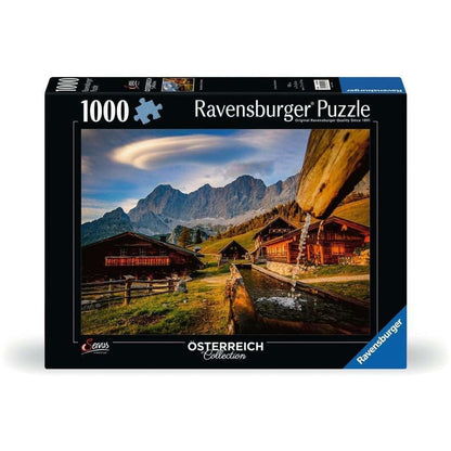 Ravensburger 1000-piece puzzle box with an Austrian mountain village scene: chalets, mountains, and water flowing from a wooden trough