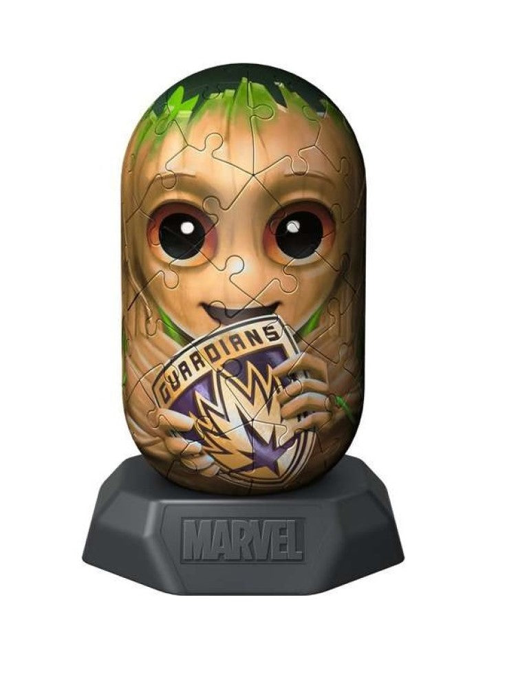 A 3D puzzle depicting Baby Groot holding a Guardians of the Galaxy logo, on a black Marvel base