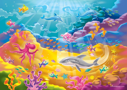 Lively ocean scene: A shark, pink octopus, two dolphins, jellyfish, seahorses and many colorful fish among coral