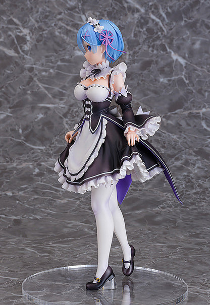 Rem anime figure in maid outfit standing on clear display base