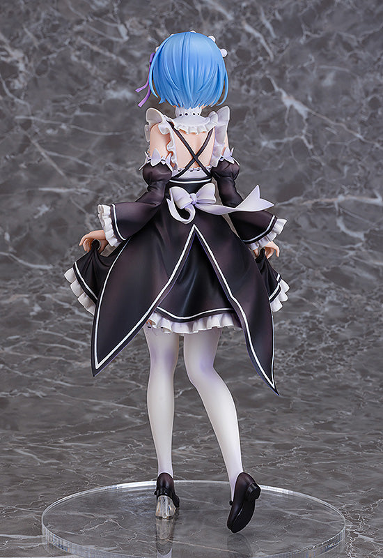 Blue-haired anime figure in black maid dress with white trim and purple ribbon accents