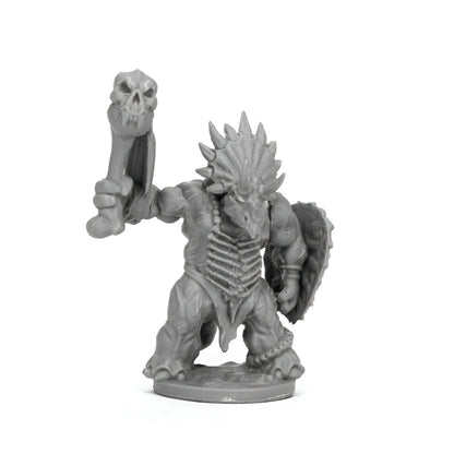 Unpainted grey fantasy miniature of a horned dinosaur warrior wielding a skull club and shield