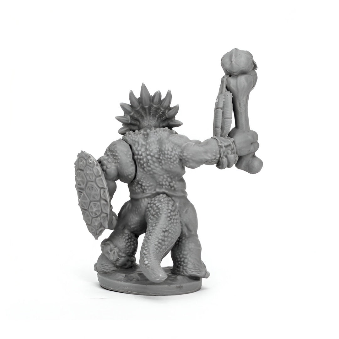 Unpainted grey monster miniature, rear view, with bumpy skin, spikes, a shield, and a bone club
