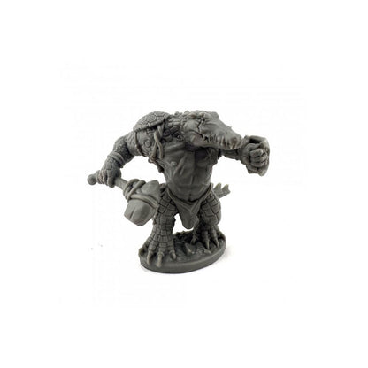 Unpainted fantasy miniature of a bipedal alligator-like monster holding a crude club