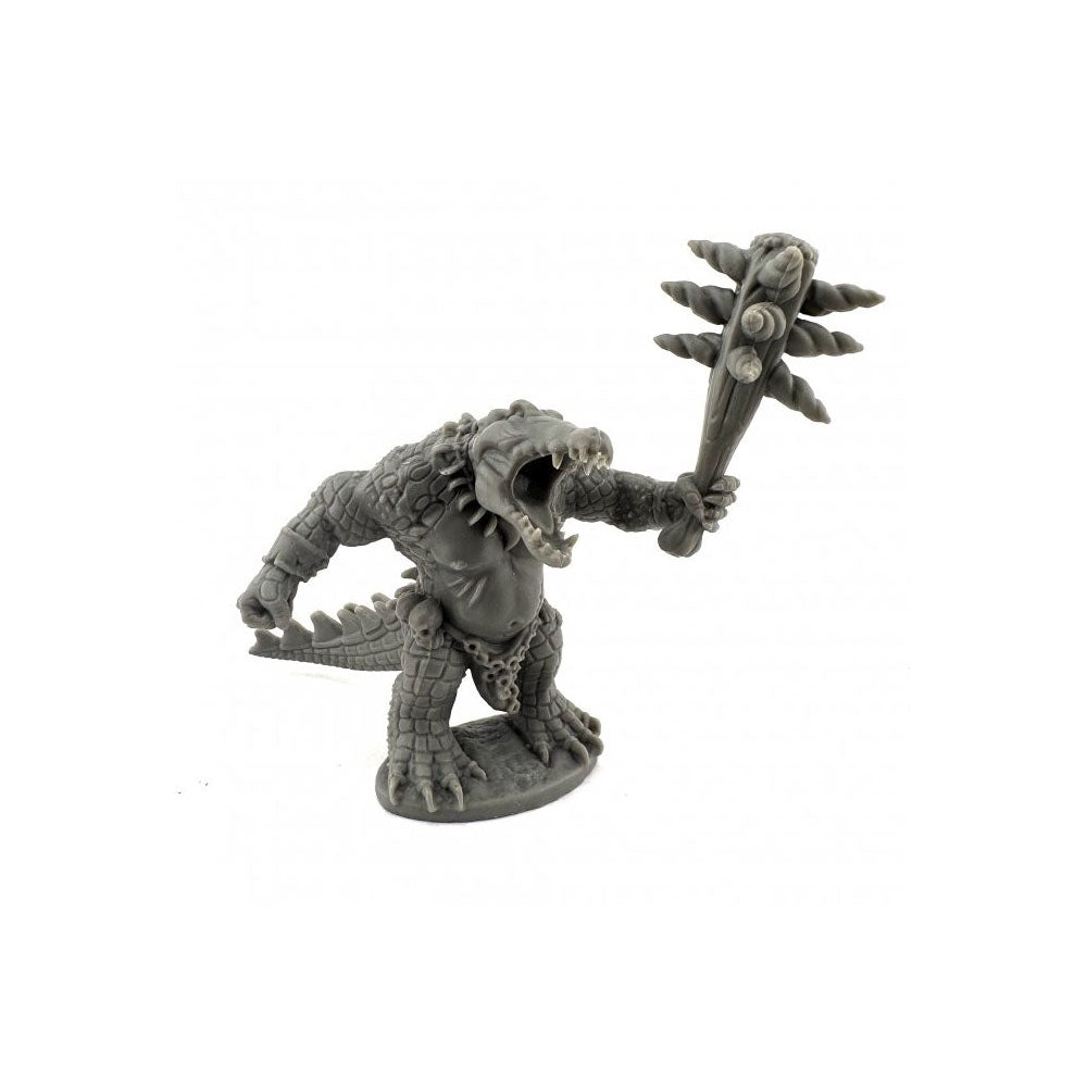 Unpainted lizardman miniature with an open, fanged mouth and scaly skin, holding a large spiked club in an aggressive pose