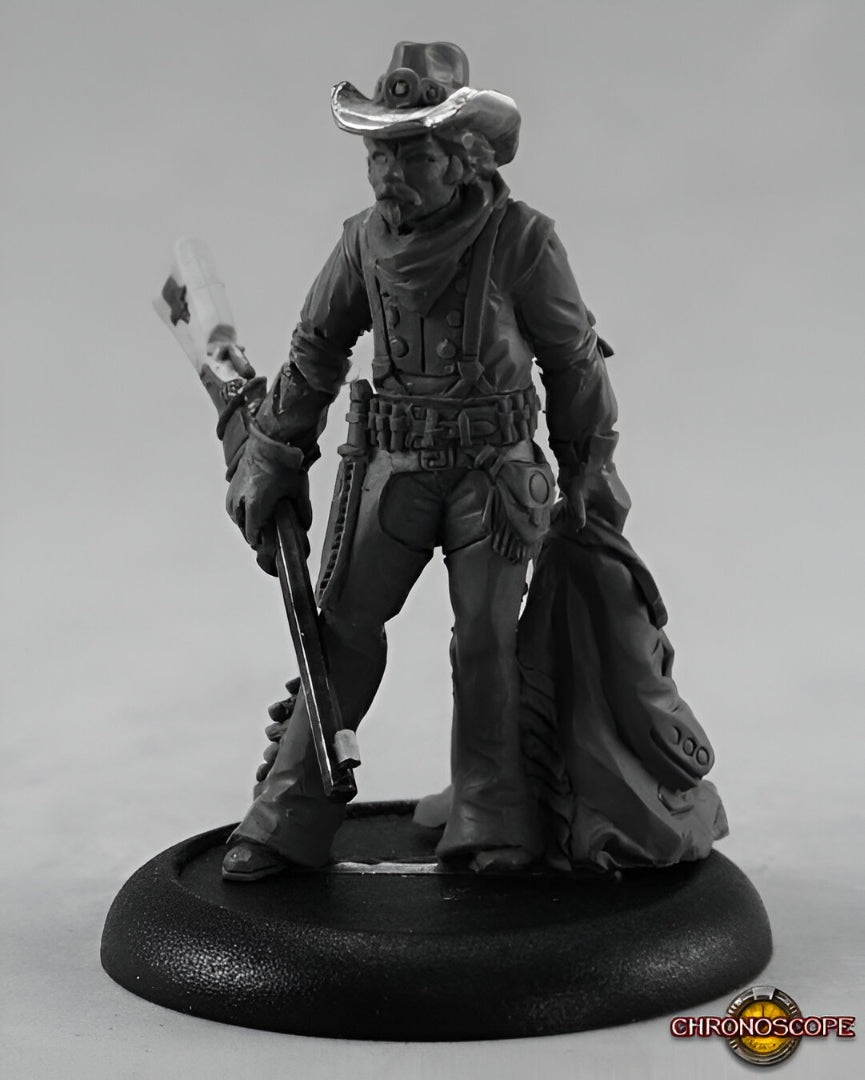 Grey miniature of a Western frontiersman in a cowboy hat, holding a rifle and a folded coat