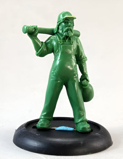 Solid green miniature of a bearded man in overalls and a cap, holding a bat over his shoulder and a bag
