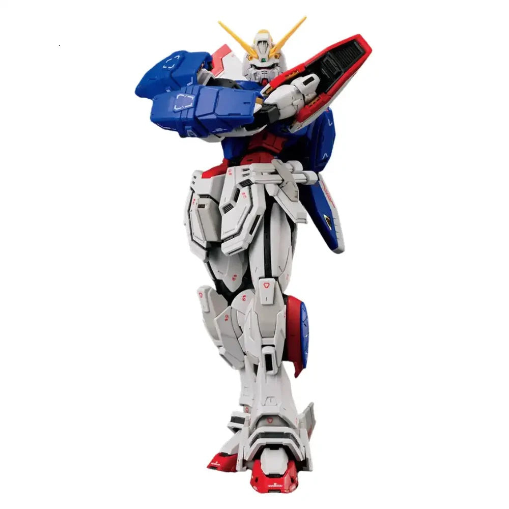 A white, blue, and red Gundam model standing with its left arm bent across its chest