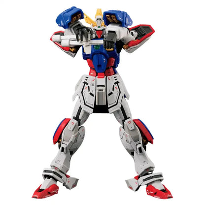 White, blue, and red Gundam model with gold accents, aiming a rifle